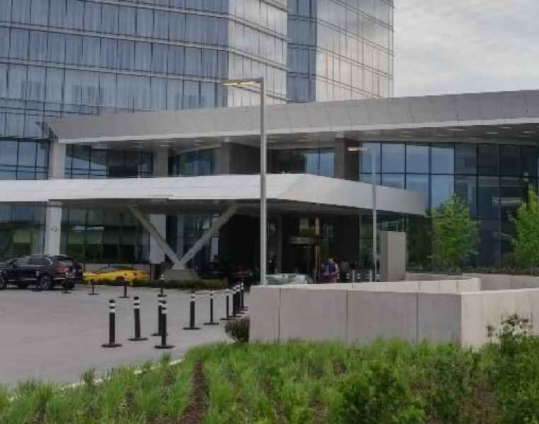 Luminaire In Front Of Building Entrance