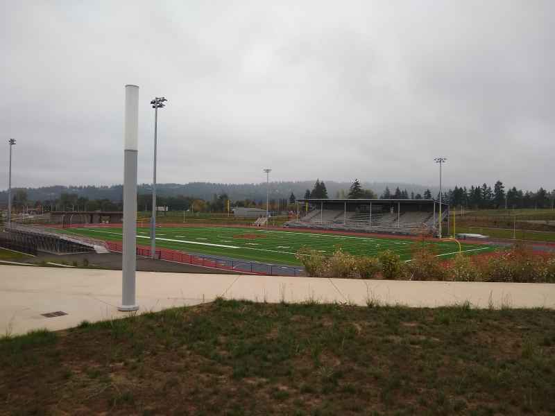 High School Football Field and Track Behind Column